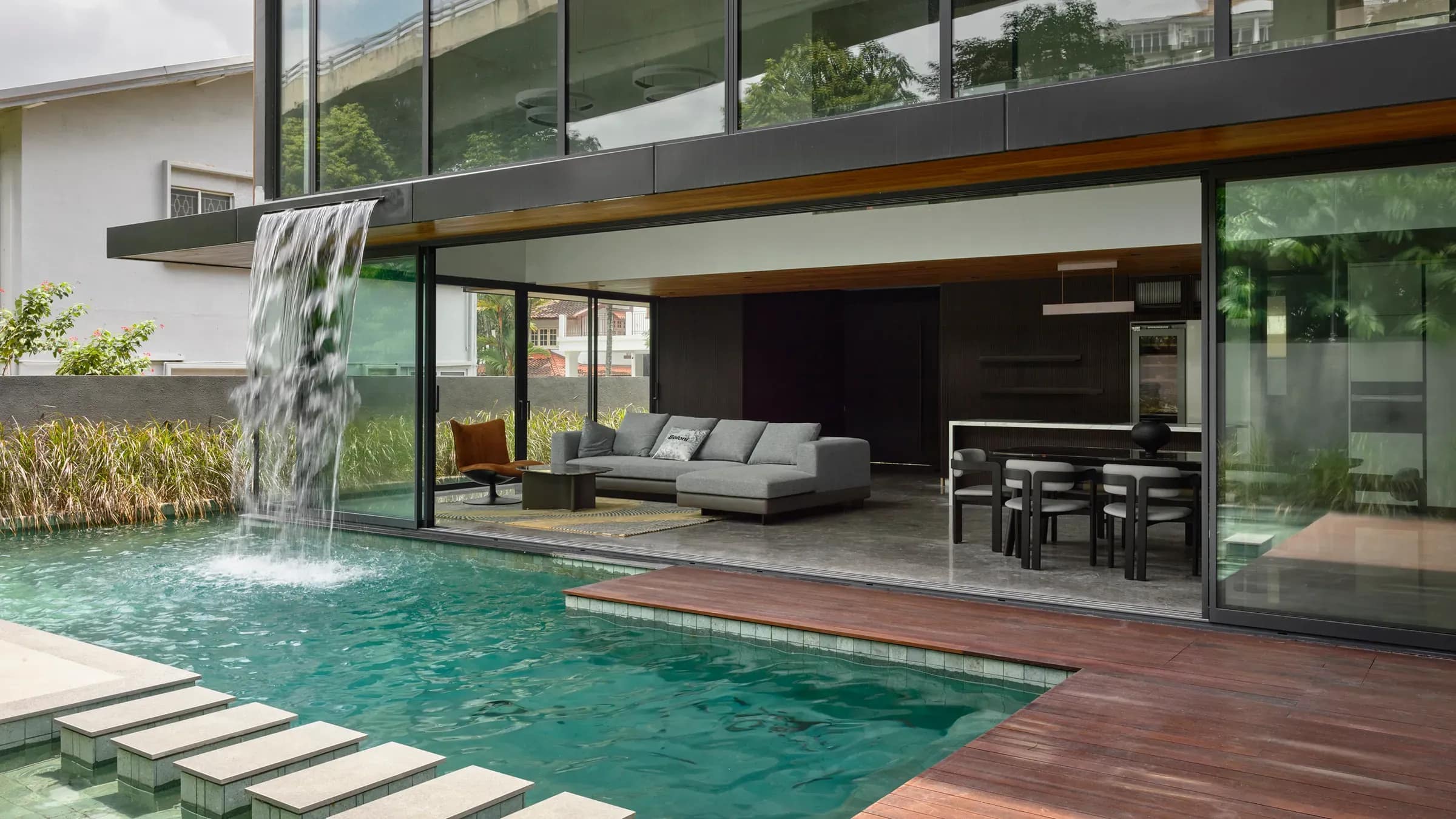The pool and waterfall at Westlake Avenue, the living room open to it.